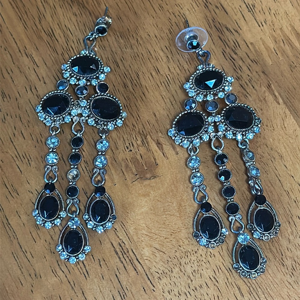 Black and gold chandelier earrings. Rhinestones are silver in color. Costume
